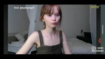 Cute innocent teen teasing in webcam